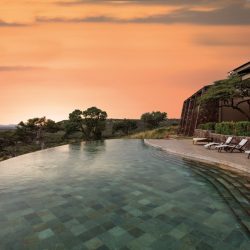 infinity pool with sunset